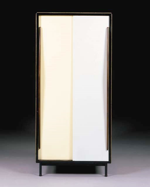 A MAHOGANY VENEERED AND ENAMELED STEEL ARMOIRE