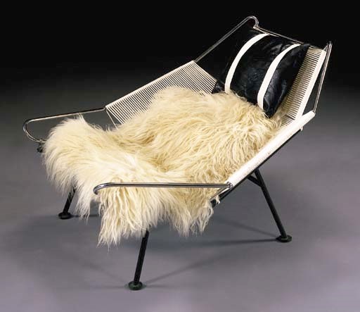 A CHROME, PAINTED STEEL AND ROPE 'FLAG LINE' CHAIR