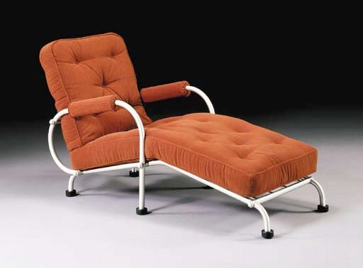 AN ALUMINUM LOUNGE CHAIR
