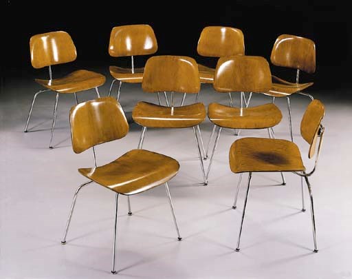 A SET OF EIGHT MOLDED PLYWOOD AND METAL 'DCM' CHAIRS