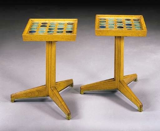 A PAIR OF WALNUT AND CERAMIC PEDESTAL TABLES