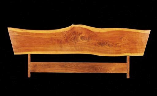 A WALNUT PLANK HEADBOARD