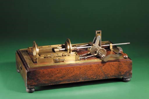 A finely engineered, probably instrument maker's manually-operated brass and ferrous metal salesman's cutaway demonstration model of a cut-off valve gear,
