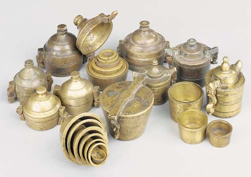 Ten brass nested cup-weights,