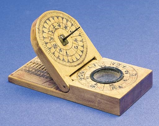A wooden Chinese inclining compass sundial,