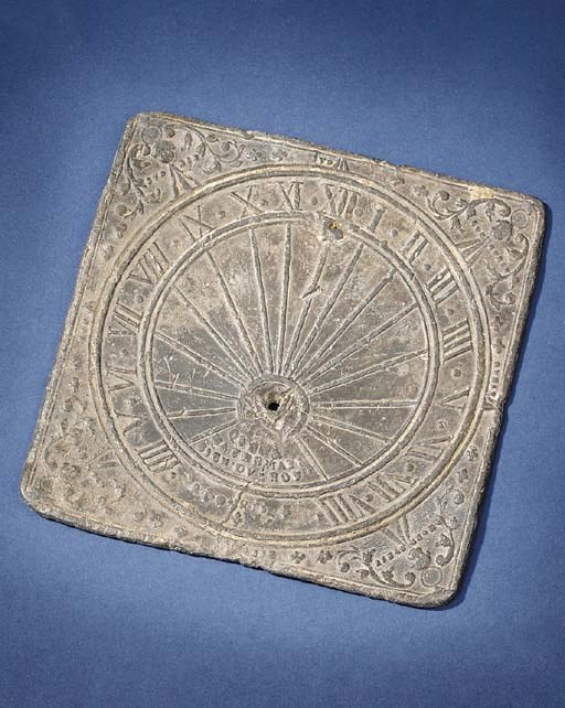 A rare 17th-Century French lead vertical sundial,
