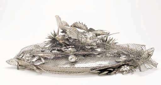 AN ITALIAN SILVER COVERED FISH PLATTER