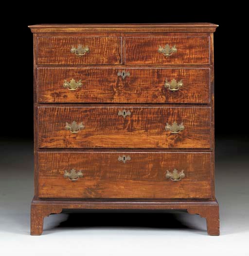 A CHIPPENDALE FIGURED MAPLE CHEST-OF-DRAWERS