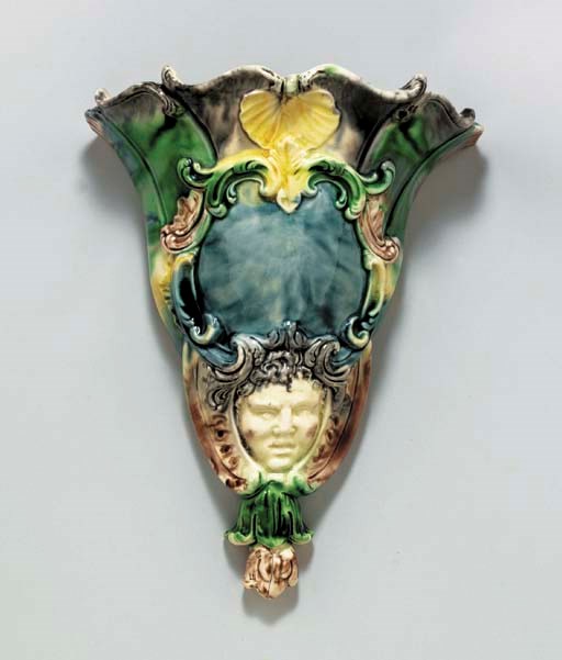 A STAFFORDSHIRE CREAMWARE WALL-POCKET