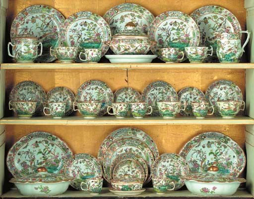 AN INITIALLED 'CANTON FAMILLE ROSE' PART DINNER SERVICE