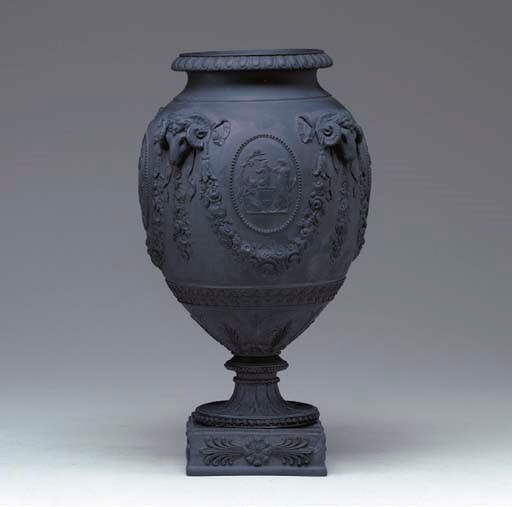 A WEDGWOOD & BENTLEY BLACK BASALTES VASE