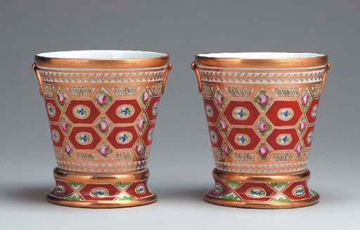 A PAIR OF COALPORT FLOWER POTS AND STANDS