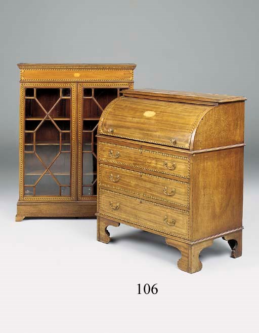 An Edwardian mahogany and line inlaid cylinder bureau bookcase