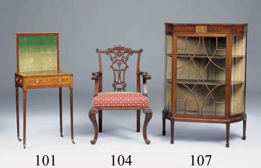 An Edwardian mahogany and line inlaid D-shaped display cabinet