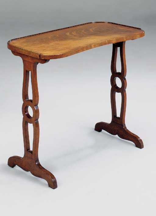 A LATE GEORGE III MAHOGANY WRITING TABLE