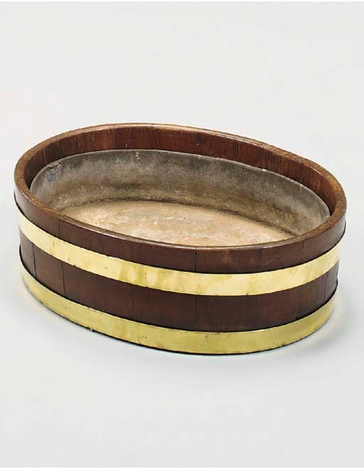 A GEORGE III AND BRASS BOUND OVAL JARDINIERE