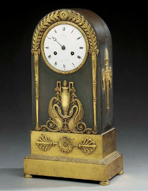 An Empire gilt and patinated bronze mantel clock, early 19th century