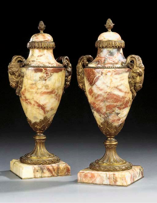 A pair of French ormolu mounted Breccia marble urns, late 19th century