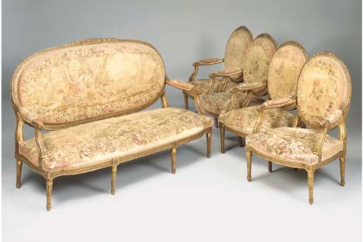 A FRENCH CARVED GILTWOOD AUBUSSON UPHOLSTERED SALON SUITE, 19TH CENTURY IN THE LOUIS XVI STYLE