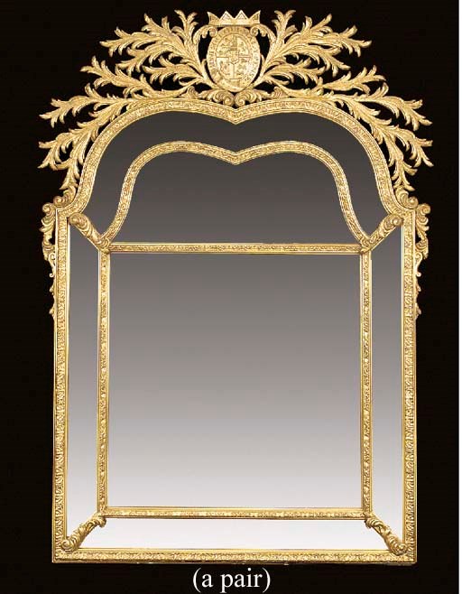 A pair of arched rectangular giltwood mirrors of recent manufacture