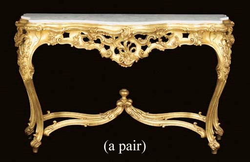 A pair of rococco style giltwood serpentine console tables of recent manufacture
