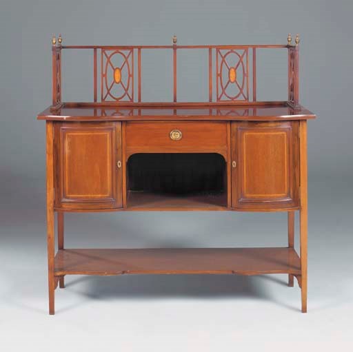 AN EDWARDIAN SCOTTISH MAHOGANY AND MARQUETRY SERPENTINE SIDEBOARD
