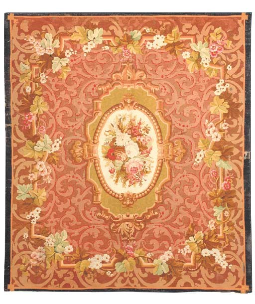 AN AUBUSSON RUG,