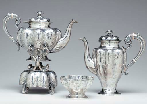 A FIVE-PIECE MEXICAN SILVER TEA AND COFFEE SERVICE ON TRAY**,