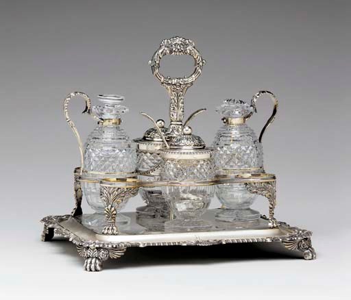A GEORGE III SILVER CRUET SET,