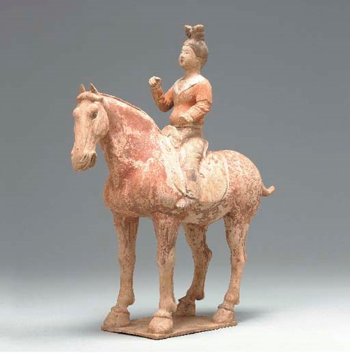 A Painted Pottery Figure of an Equestrienne,