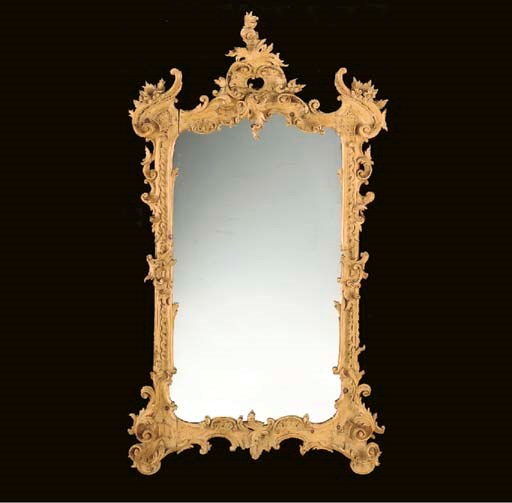 A GEORGE II STYLE PINE MIRROR