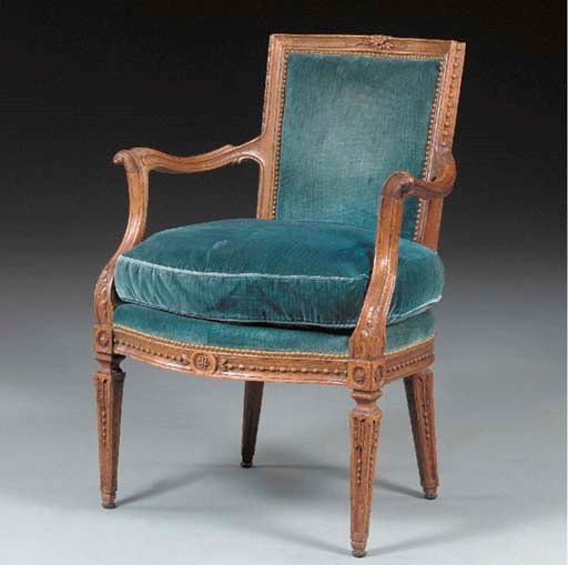 A NORTH ITALIAN NEOCLASSIC WALNUT FAUTEUIL,