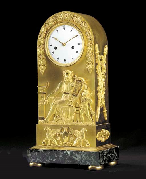 AN EMPIRE ORMOLU AND VERDE ANTICO MARBLE MANTEL CLOCK,