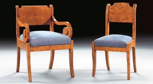 A MATCHED SET OF FOUR RUSSIAN NEOCLASSIC KARELIAN BIRCH DINING CHAIRS,