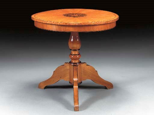 A BALTIC FRUITWOOD, MARQUETRY AND PARCEL-EBONIZED CENTER TABLE,