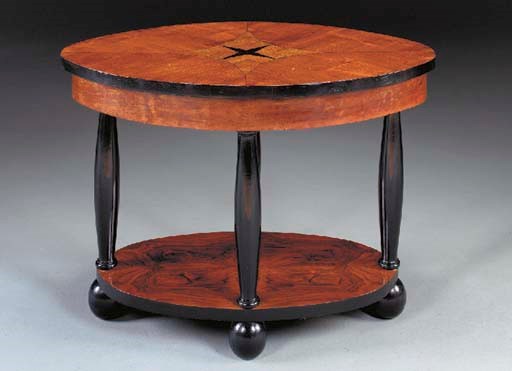 A SOUTH GERMAN OR AUSTRIAN BIEDERMEIER STYLE STAINED-SATIN BIRCH, WALNUT AND EBONIZED CENTER TABLE,