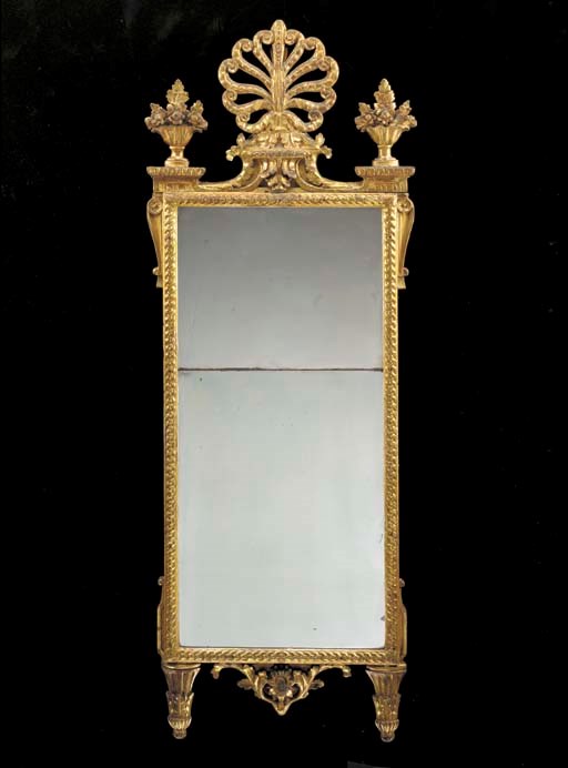 A NORTH ITALIAN NEOCLASSIC GILT-VARNISHED SILVERED (MECCA) MIRROR,