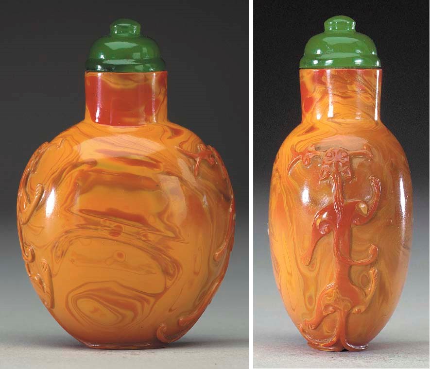 A RARE AND WELL-CARVED REALGAR GLASS BOTTLE