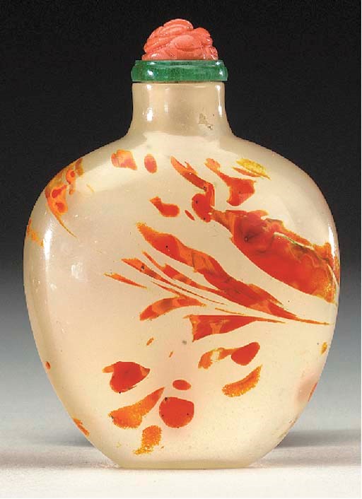 AN UNUSUAL SANDWICHED REALGAR-SPLASHED GLASS BOTTLE