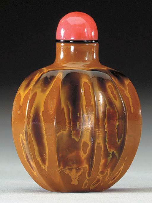 AN UNUSUAL REALGAR GLASS BOTTLE
