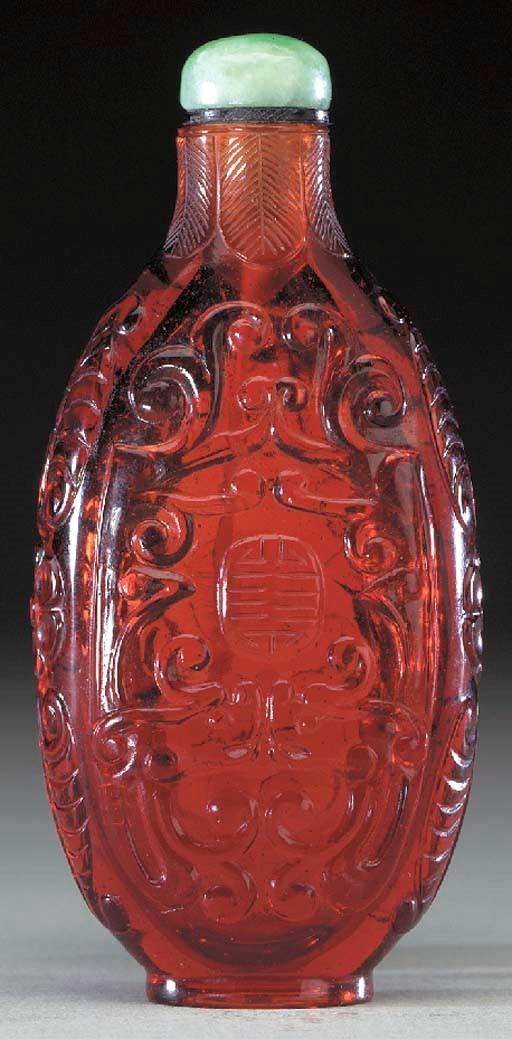 A FINE CARVED RUBY-RED GLASS BOTTLE