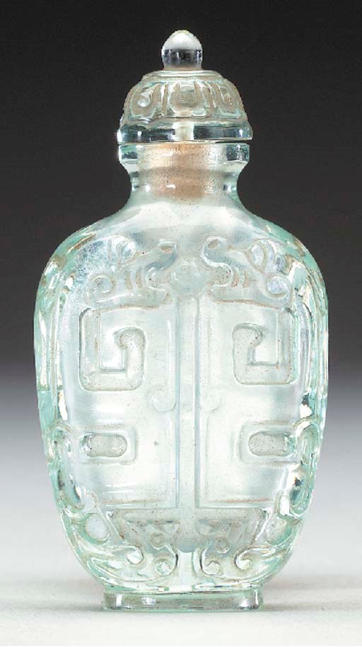 A RARE 'IMITATION AQUAMARINE' GLASS BOTTLE