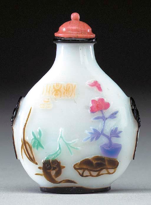 A FIVE-COLOR OVERLAY WHITE GLASS BOTTLE