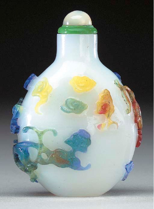 A FOUR-COLOR OVERLAY WHITE GLASS BOTTLE