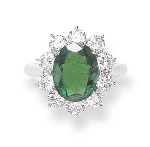 AN EMERALD AND DIAMOND RING
