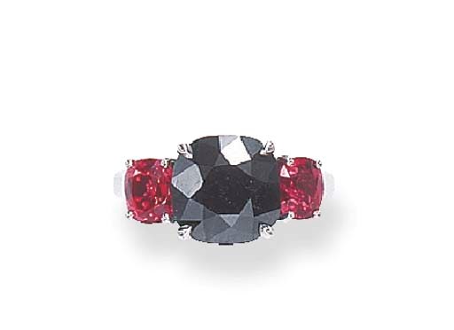 A BLACK DIAMOND AND RED SPINEL RING