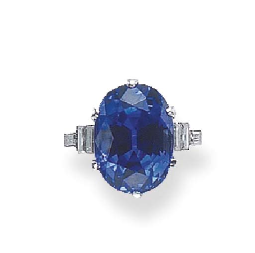 A SAPPHIRE AND DIAMOND RING