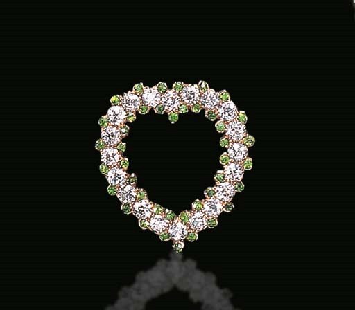 A CHARMING ANTIQUE DEMANTOID AND DIAMOND HEART BROOCH