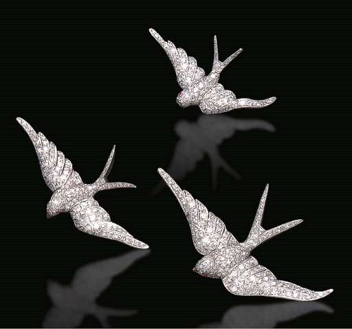 A GROUP OF DIAMOND AND RUBY BIRD BROOCHES