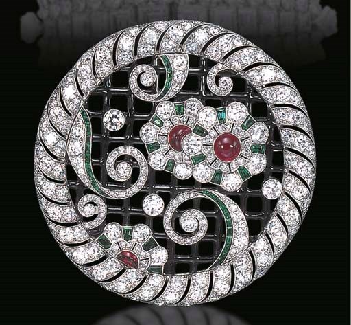 AN EXQUISITE ART DECO DIAMOND, EMERALD, RUBY, AND ENAMEL BROOCH